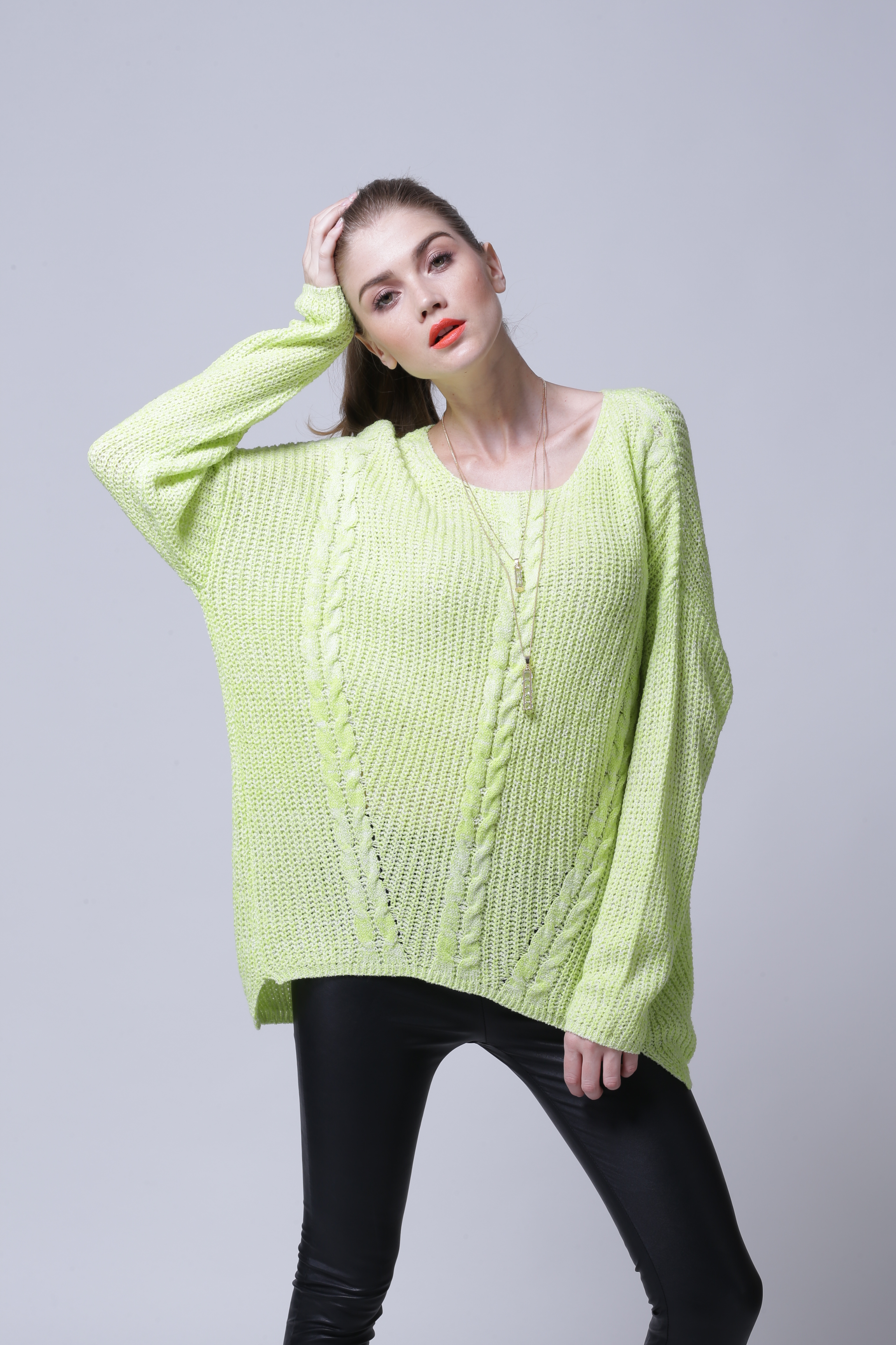 Women's soft knitted pullover IMP109 close inspection of smooth knit surface and fine stitching