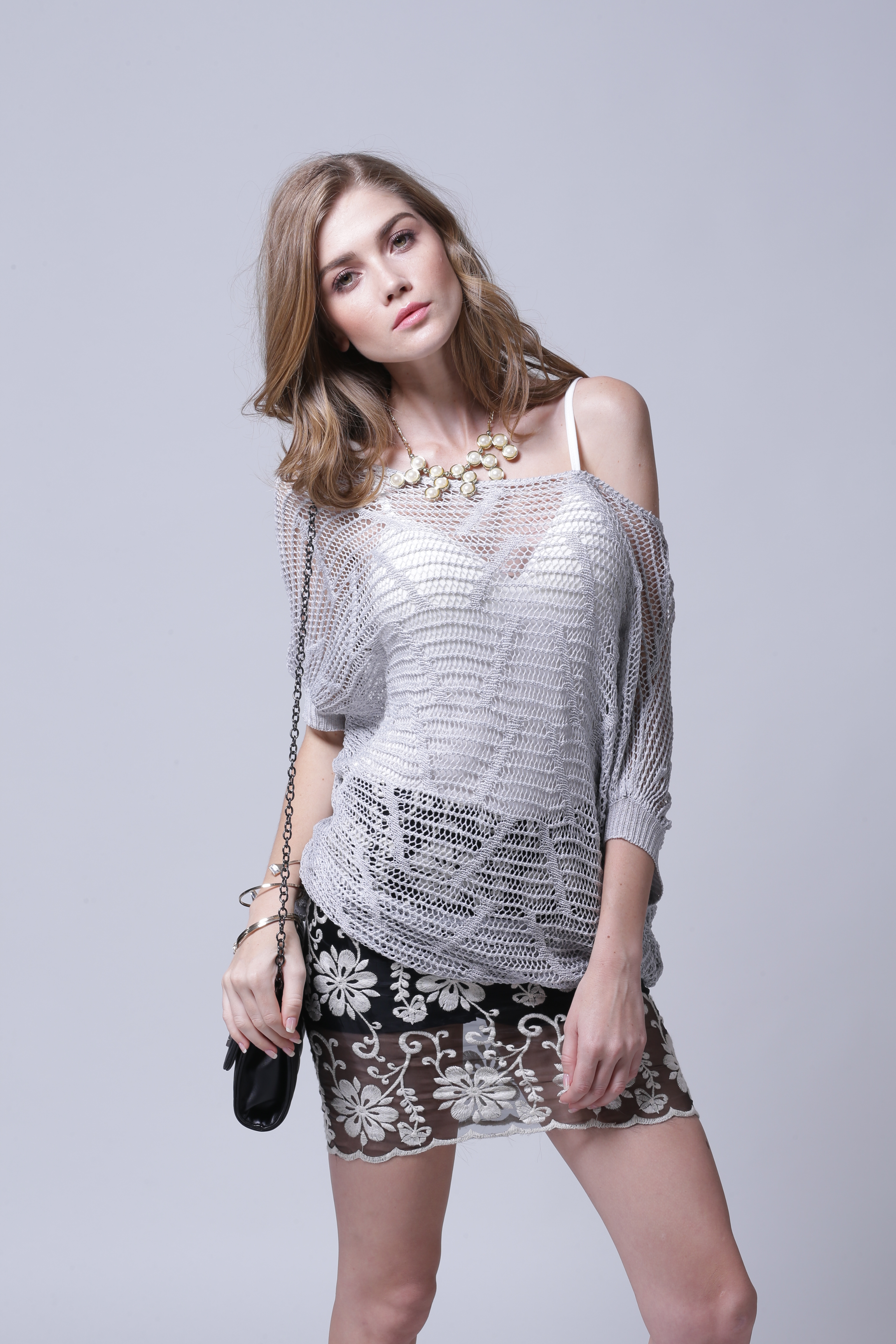 Catalog editorial framing of women's knitted pullover IMP104 ready for commercial brand wholesale