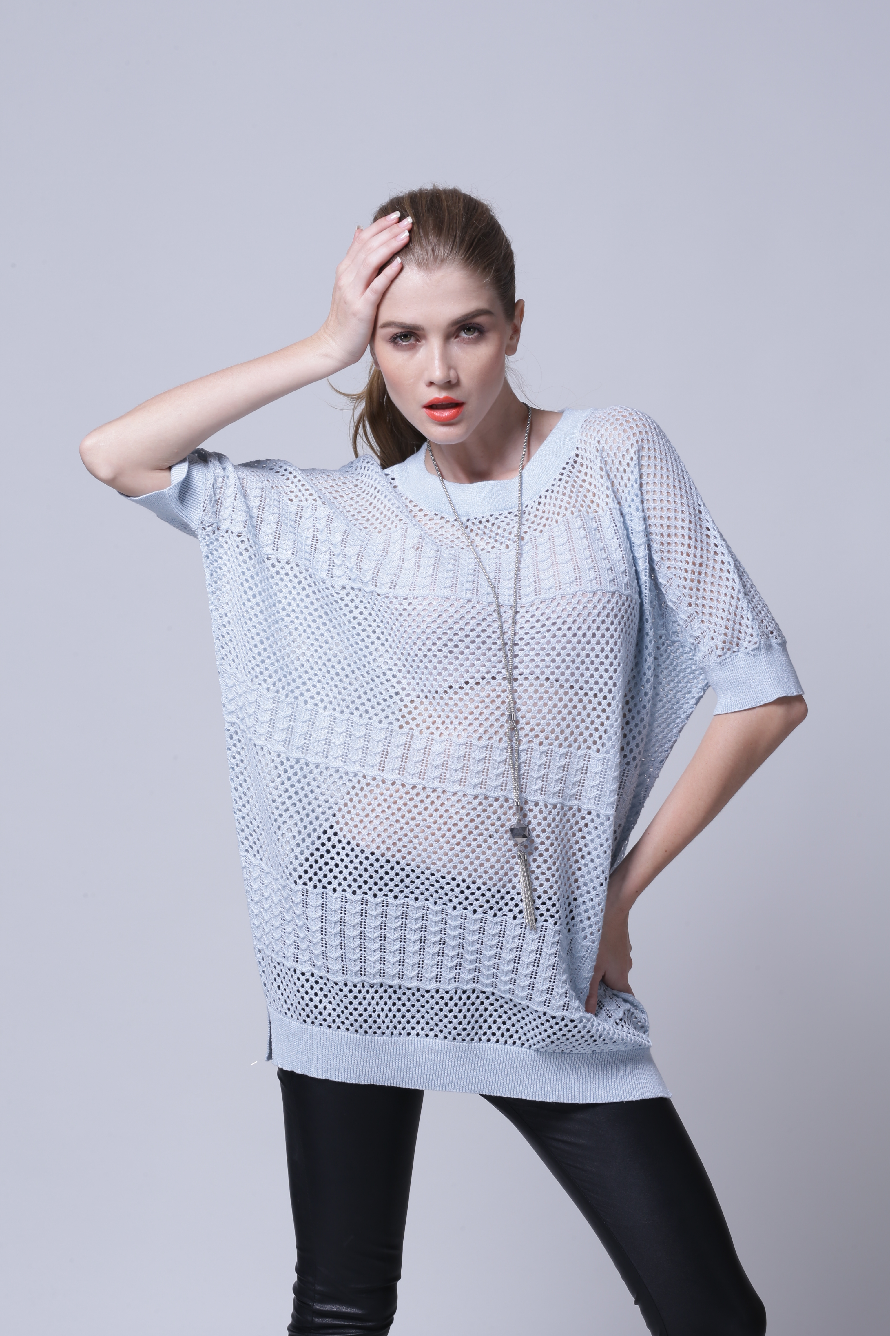 Modern layered styling presentation for women's pullover IMP112