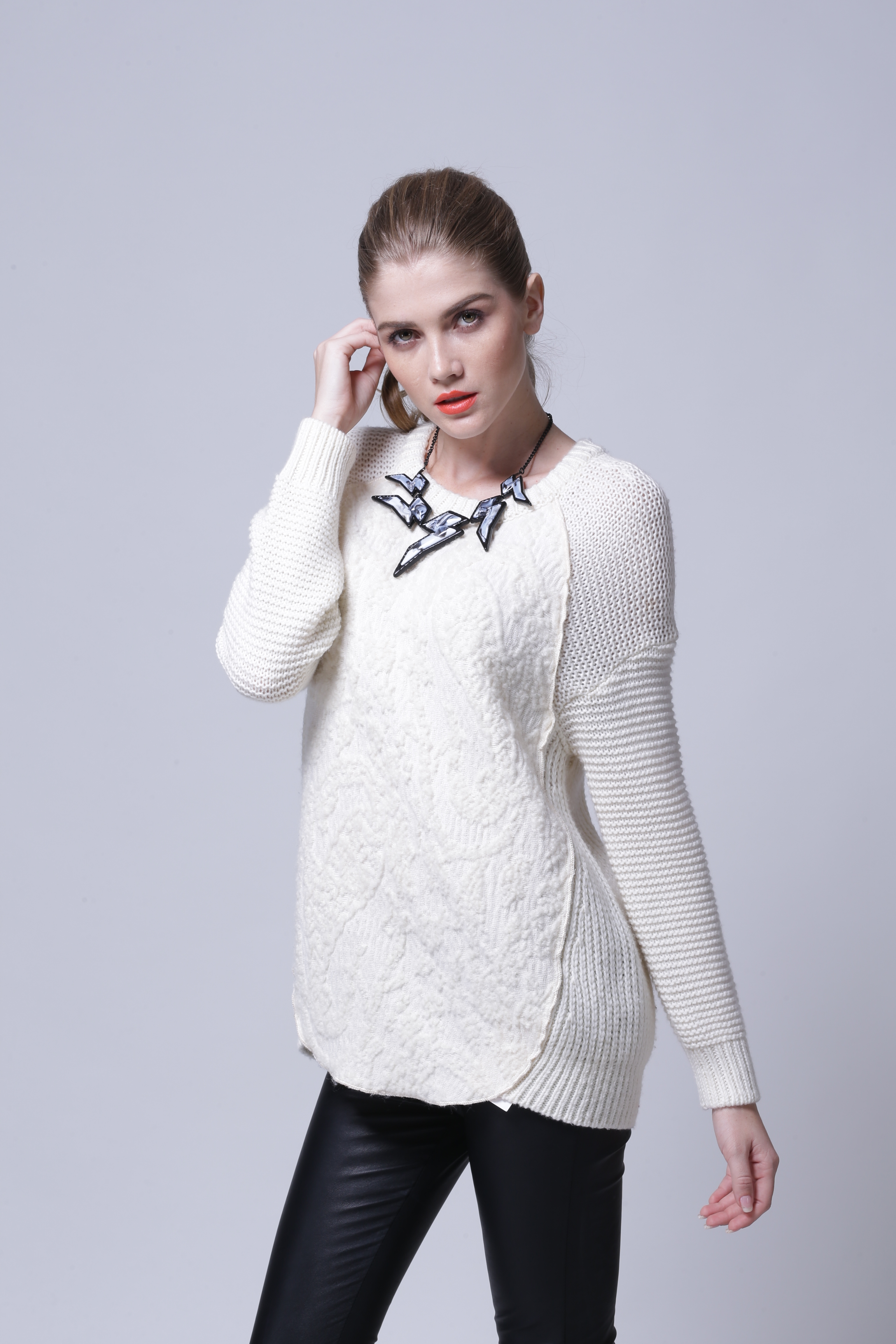 Close-up knit fabric texture of women's knitted pullover IMP113