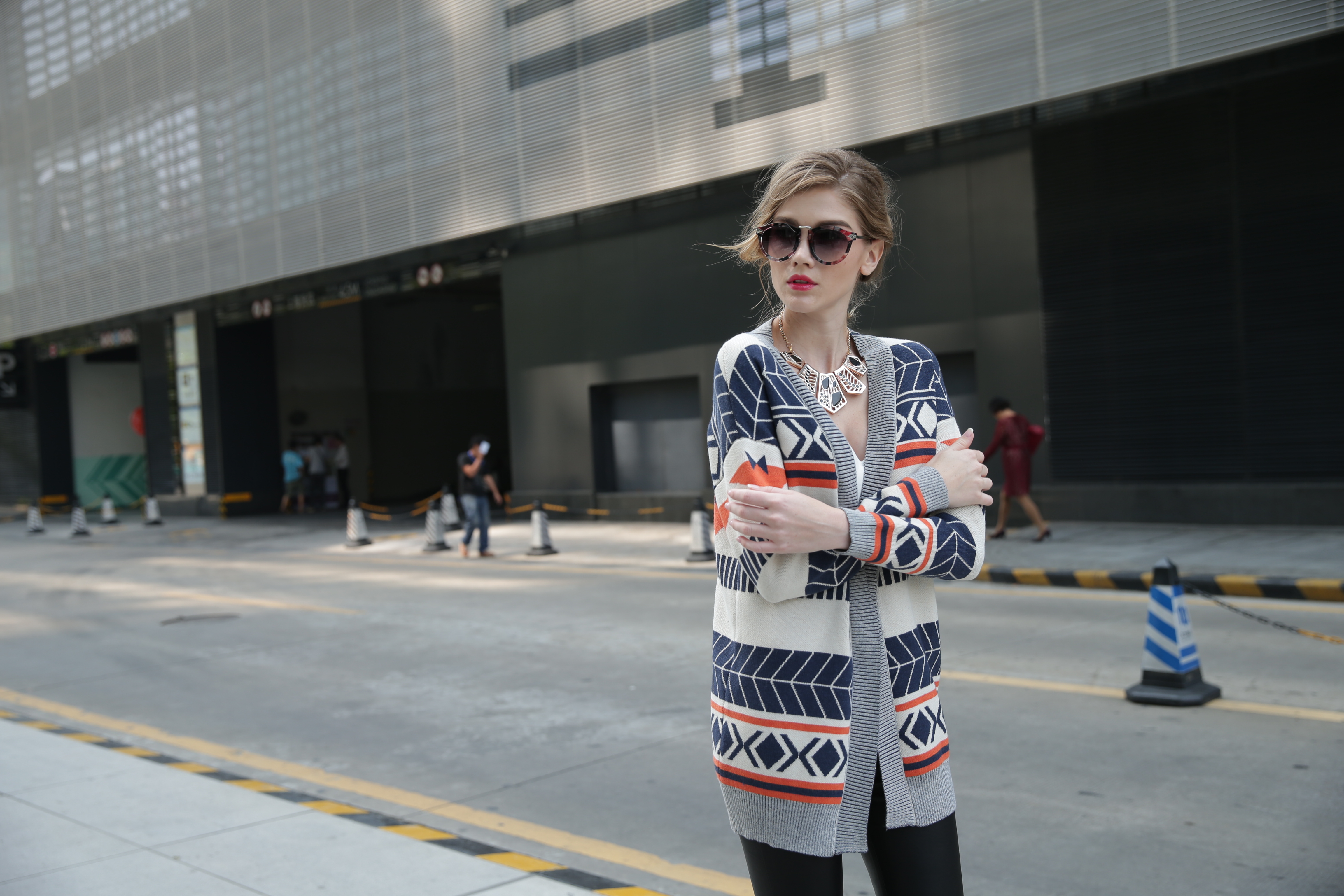 Full-length editorial framing of women's knitted cardigan IMC113 suited for private label collections