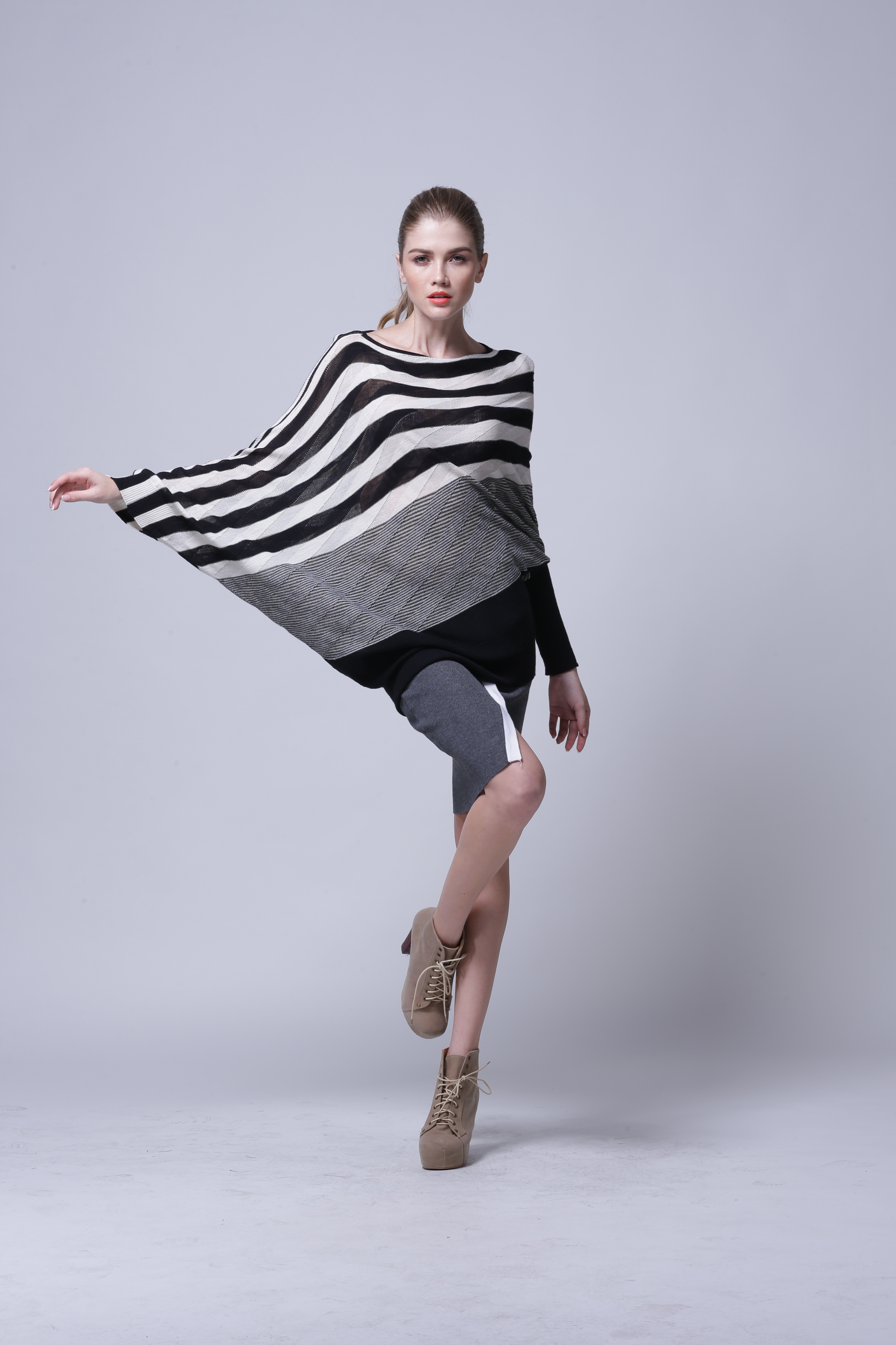 Women's knitted pullover IMP117 displaying full front silhouette in studio shot