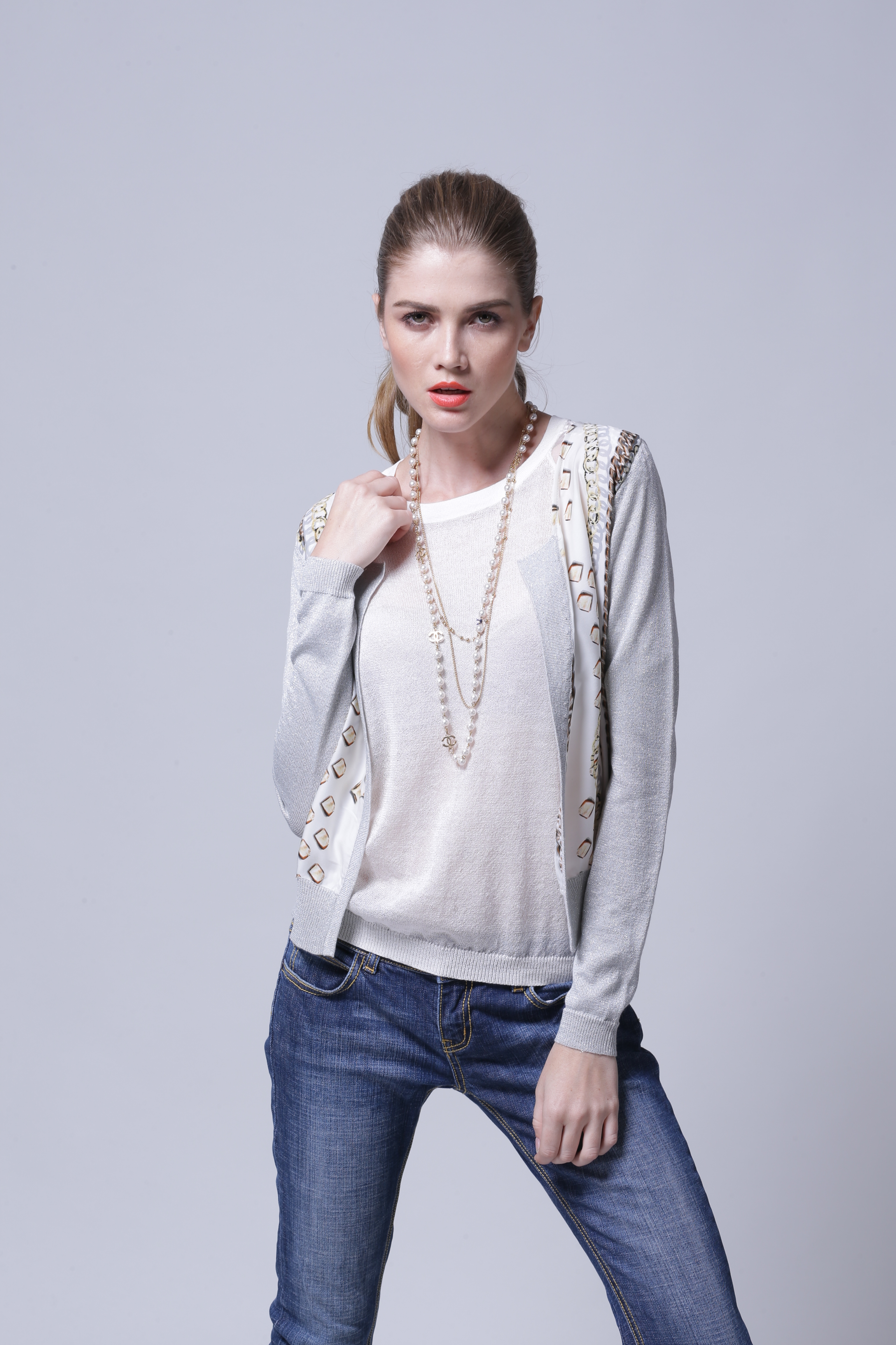 Front angle studio portrait of women's knitted cardigan IMC110