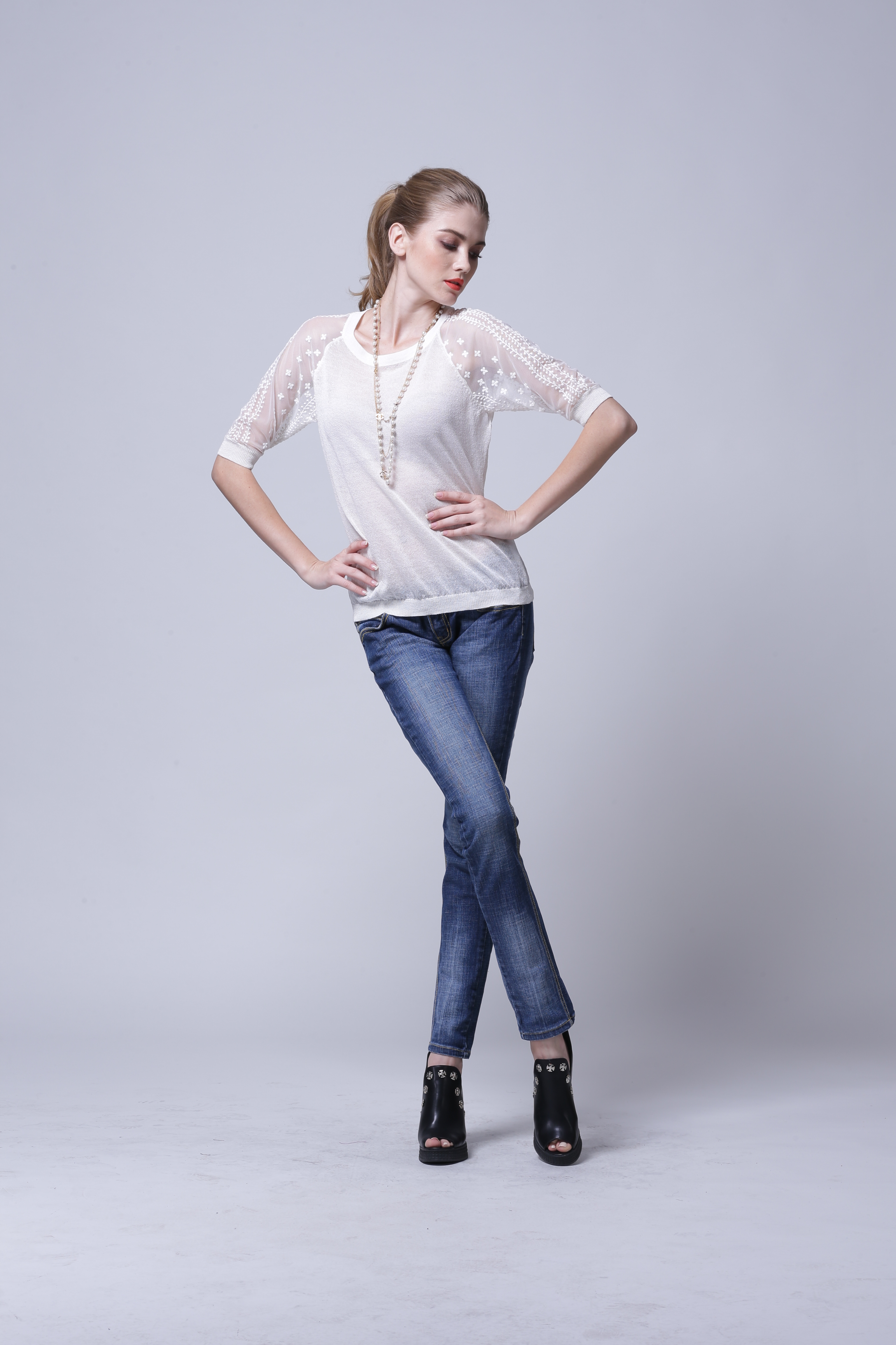 Detailed knit texture display highlighting fabric of pullover IMP115
