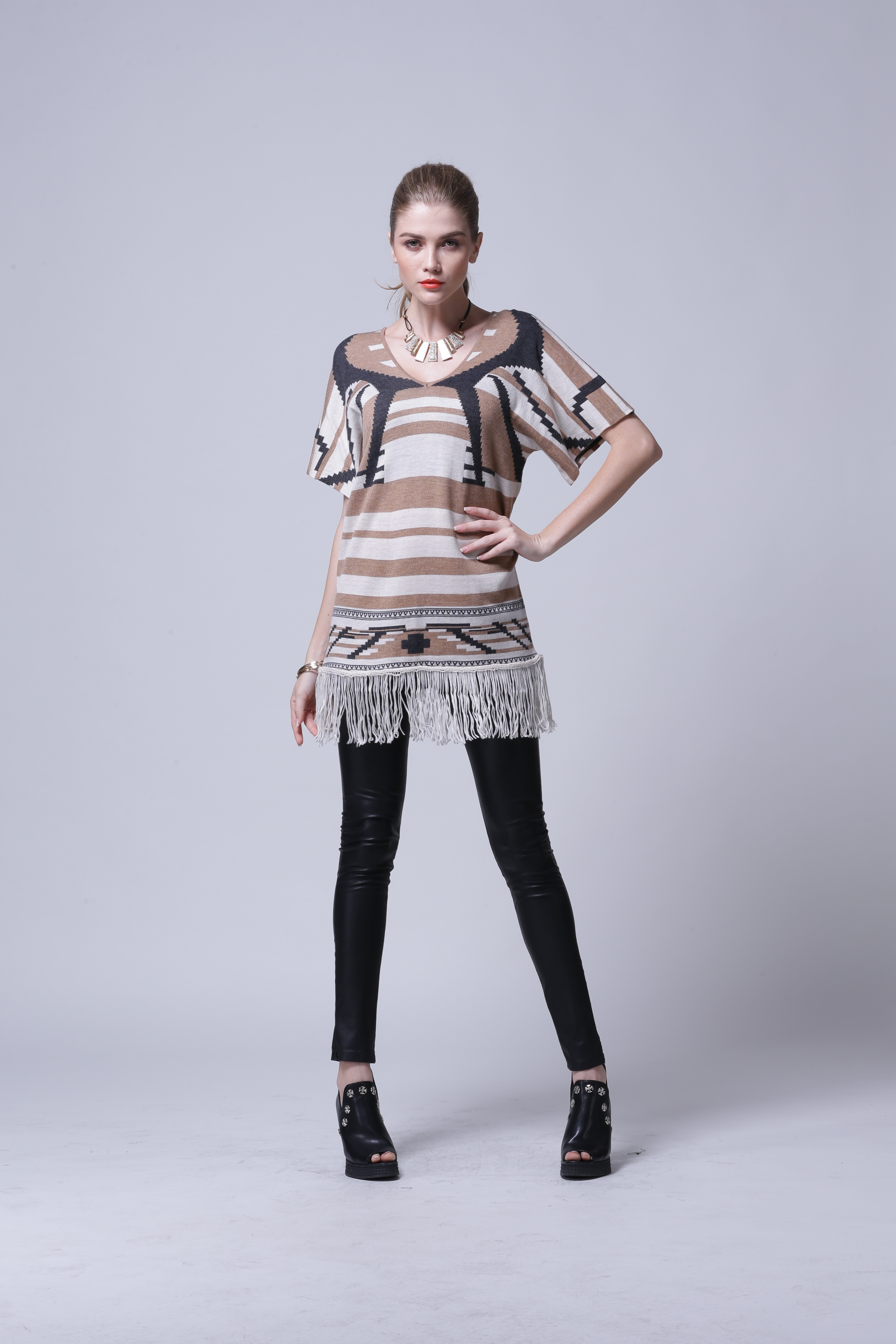 Women's essential knitted pullover IMP110 side silhouette shot highlighting smooth seam alignment