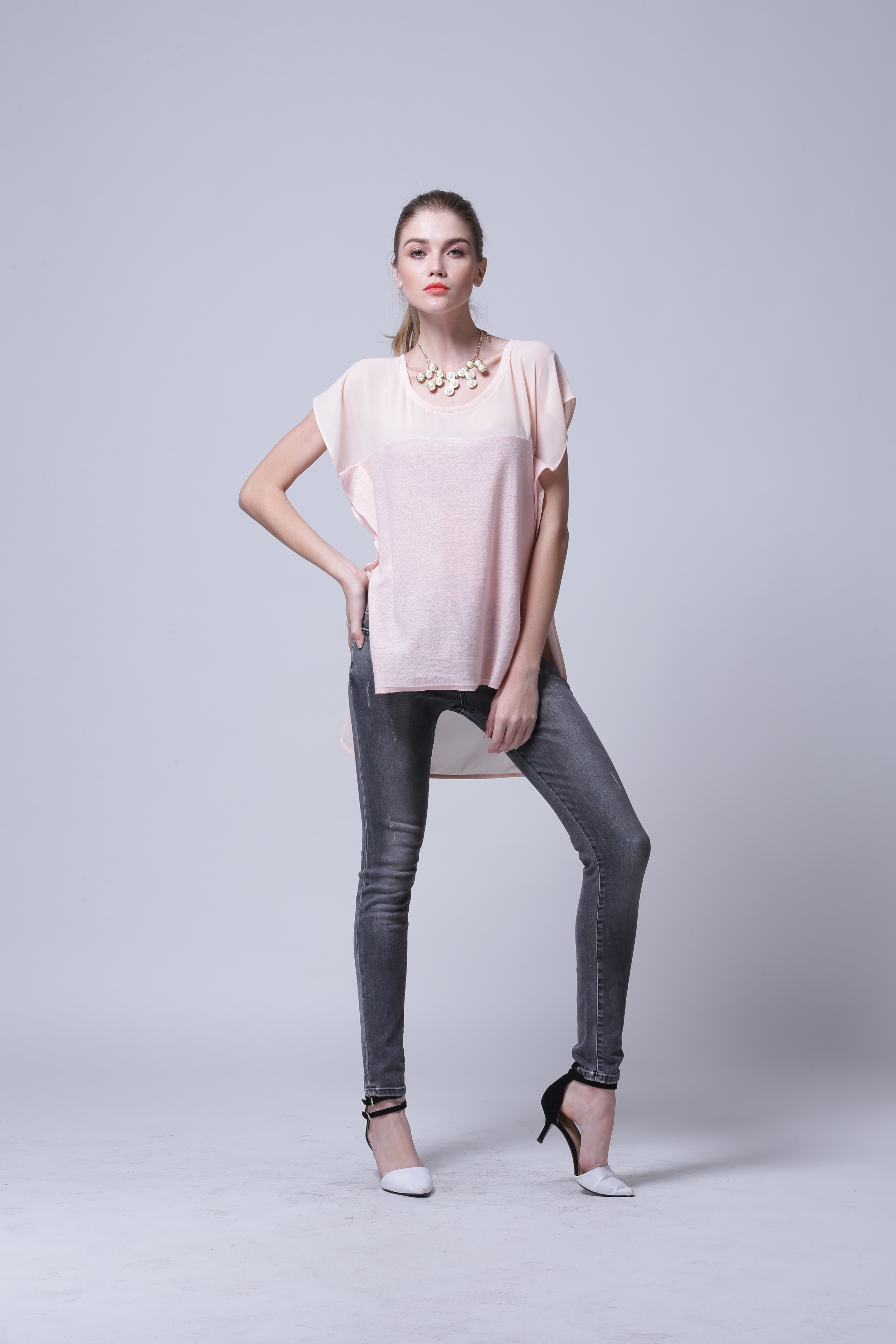 Studio front view presentation of women's knitted pullover IMP114