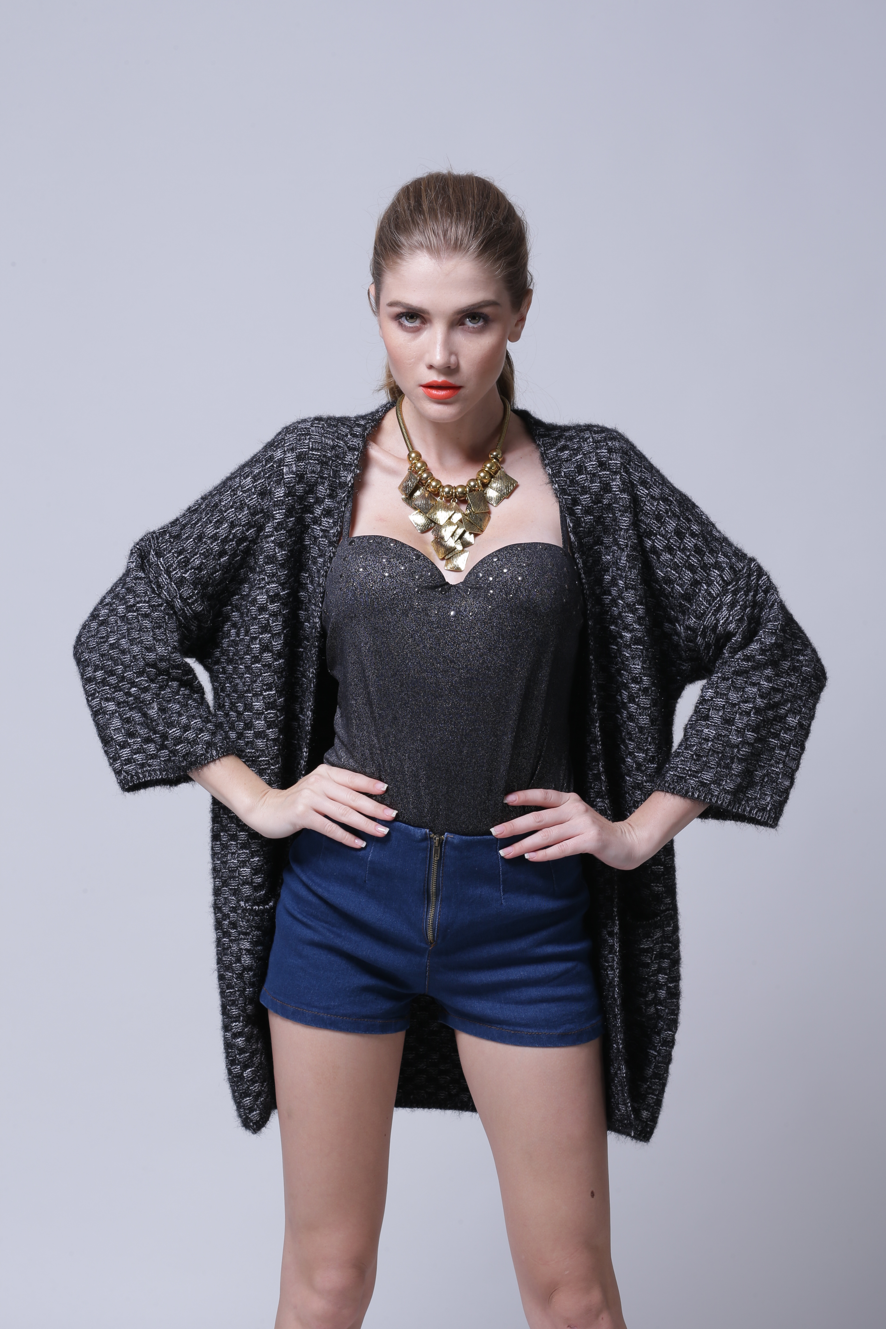 Women's knitted cardigan IMC105 – detailed inspection shot of garment trim