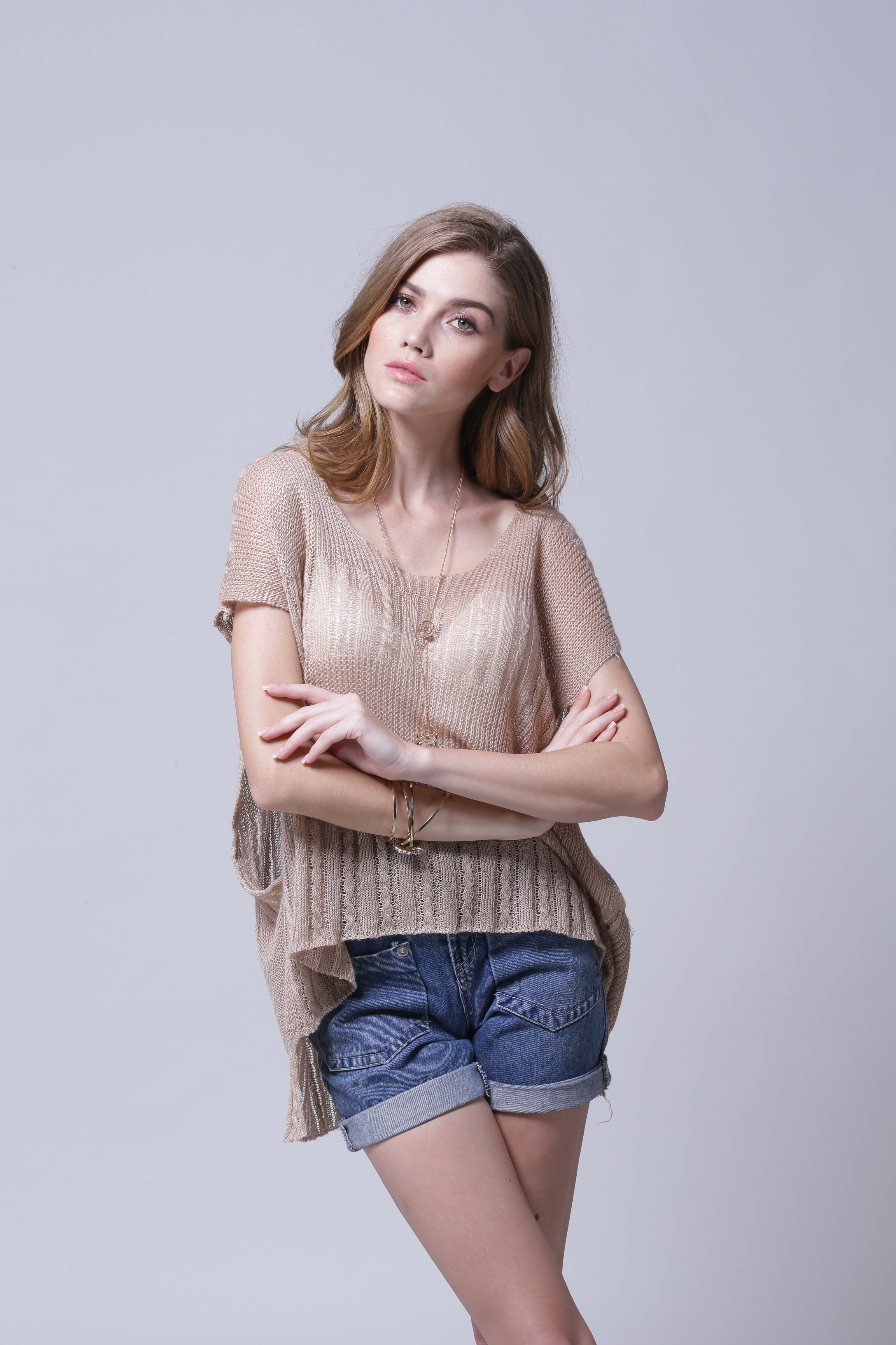 Women's knitted pullover IMP105 displaying close-up knit fabric texture and seam detailing