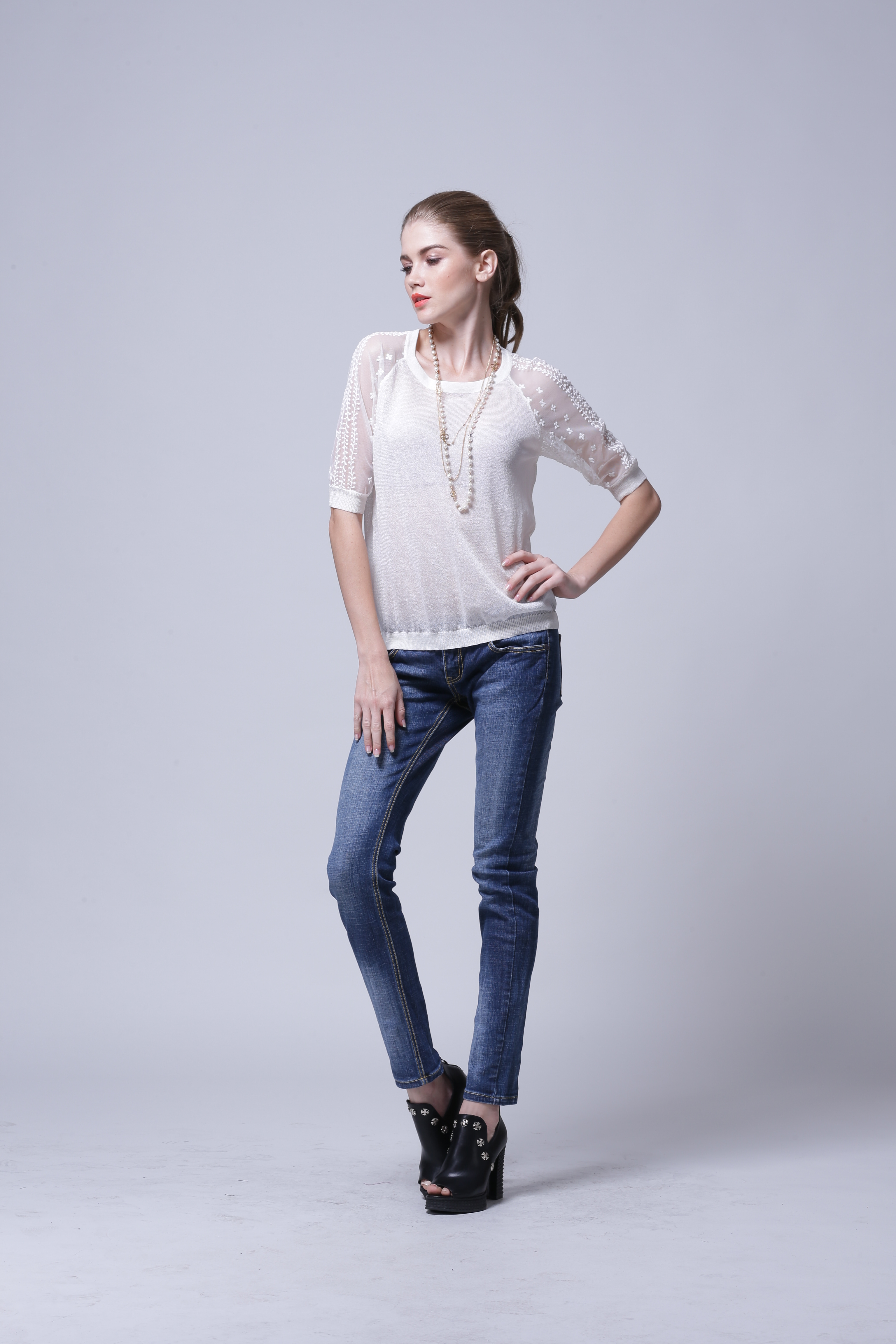 Back angle garment perspective on women's knitted pullover IMP115