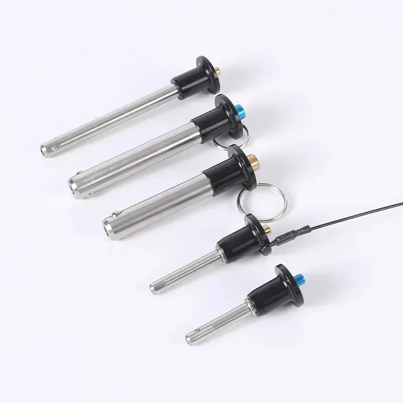 Four Y3 series stainless steel quick release pins with lanyards in a row