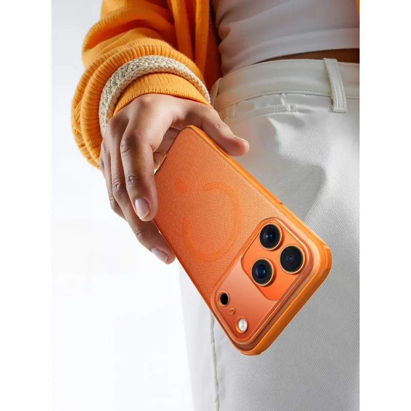 Hand holding the orange Singularity Series case
