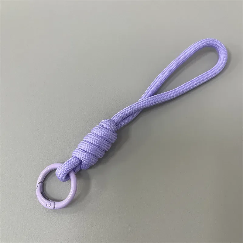 Lavender solid rope phone wrist strap on grey