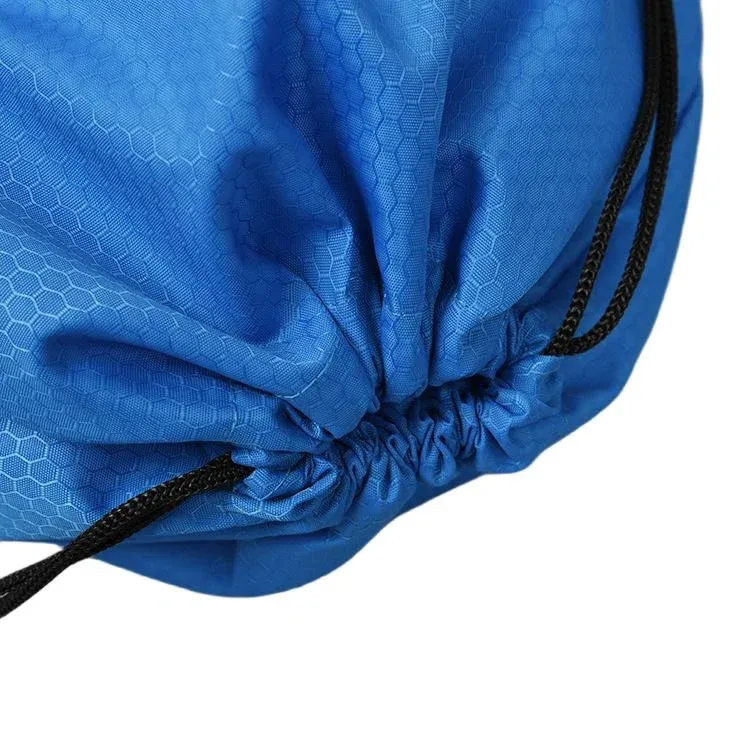 Close-up of the gathered cinch top of a royal blue drawstring backpack showing honeycomb embossed polyester and black drawcords