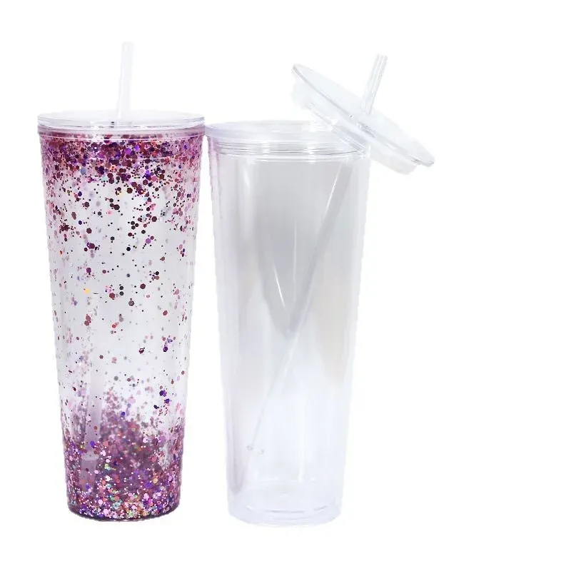 Glitter-filled and clear 24oz plastic straw tumblers side by side with lids and straws