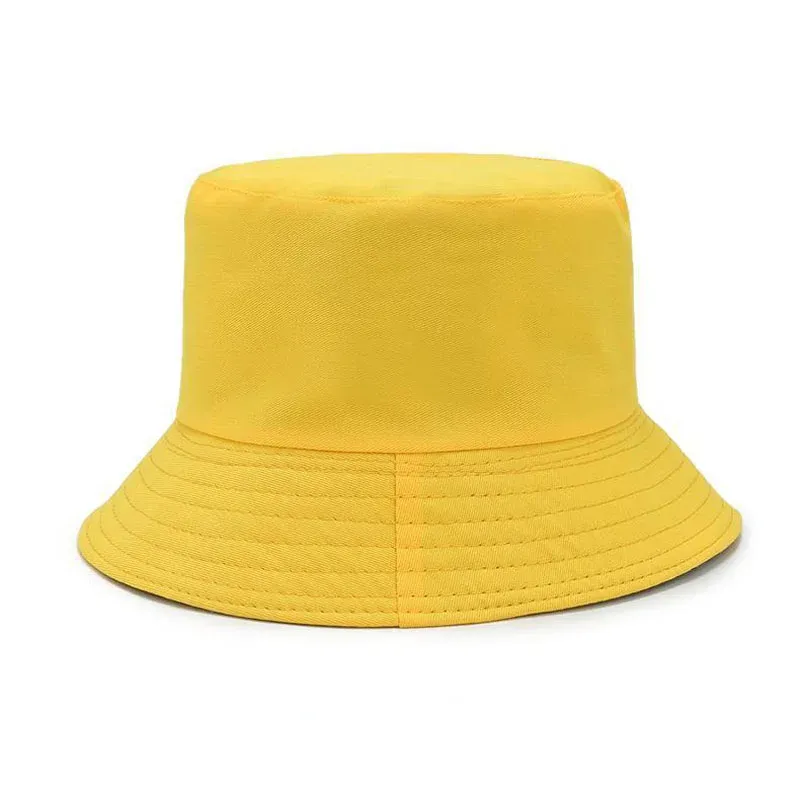 Solid yellow bucket hat with an unstructured crown and stitched all-around brim, front view