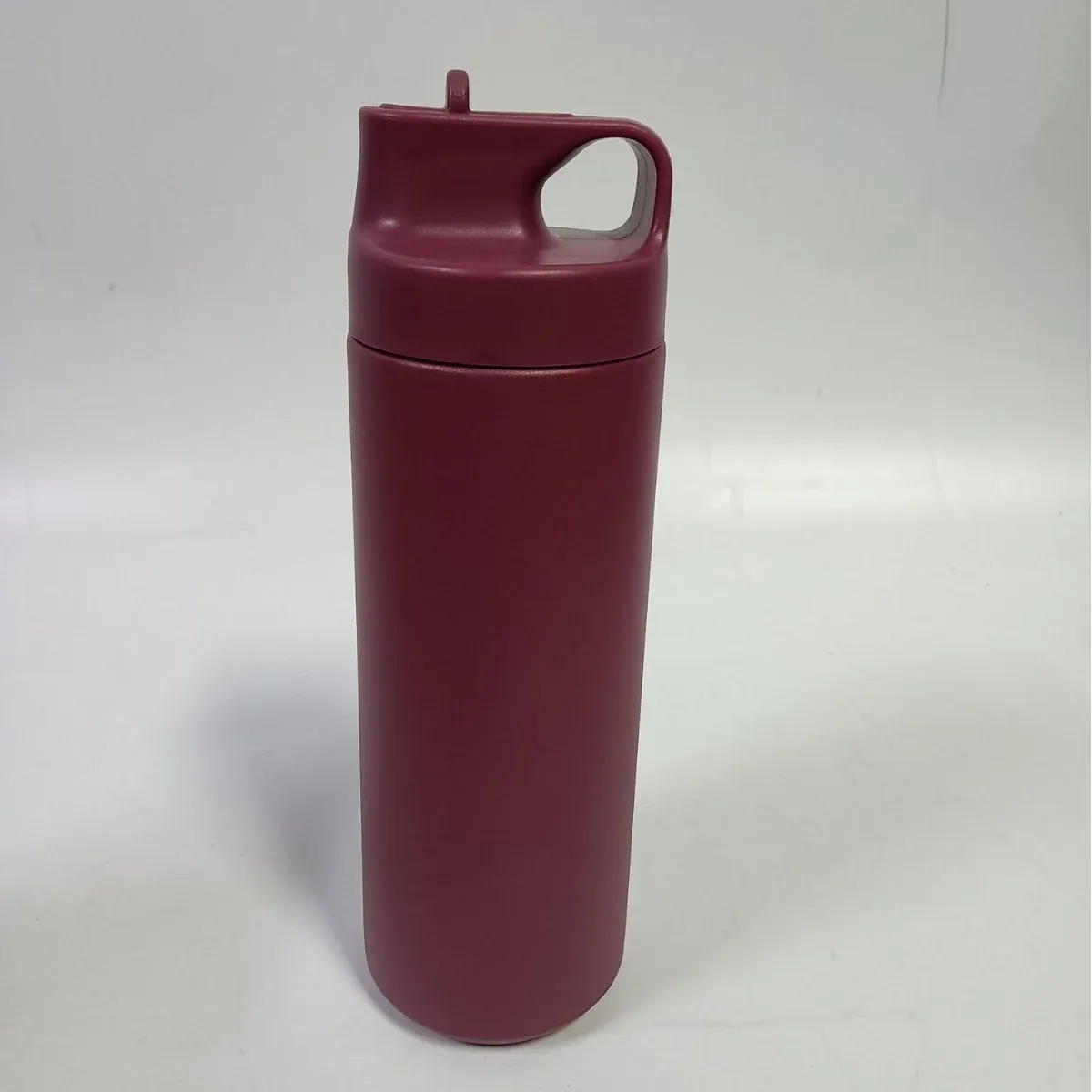 Single minimalist 500ml stainless steel water bottle in matte burgundy with integrated loop-handle spout lid