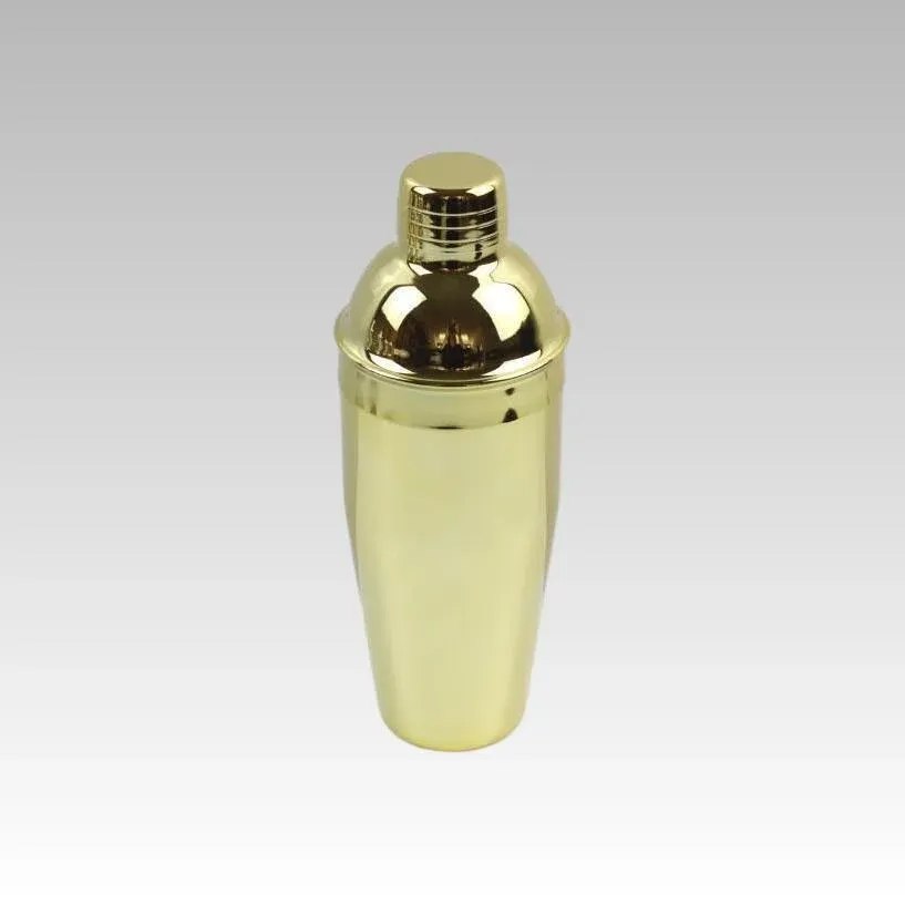 Gold-finish stainless steel three-piece cocktail shaker standing upright on a white background