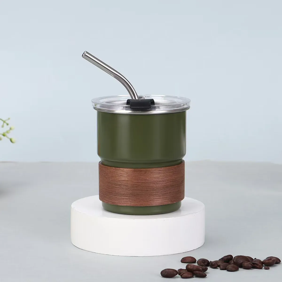 Army green tumbler with straw and wood-grain sleeve product view 1