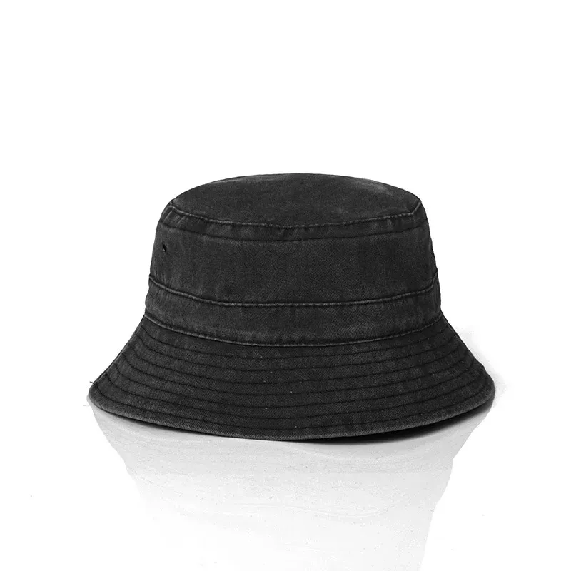 Dark grey washed denim bucket hat, straight-on front view showing the washed fabric