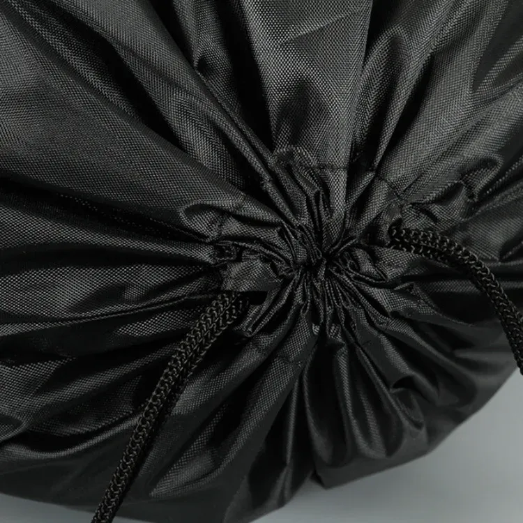 Close-up of the cinched drawstring top with black braided cord on a 210D polyester drawstring backpack