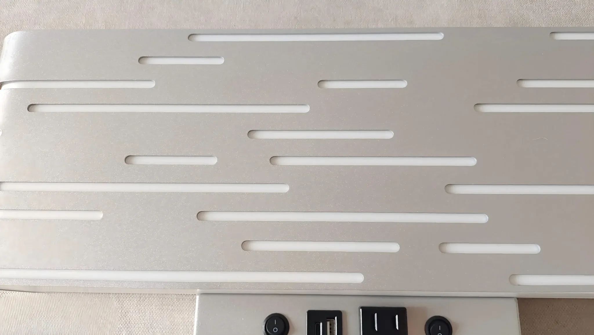 spw-2610-brushed-silver-wall-sconce-light-slots-power-outlet-detail