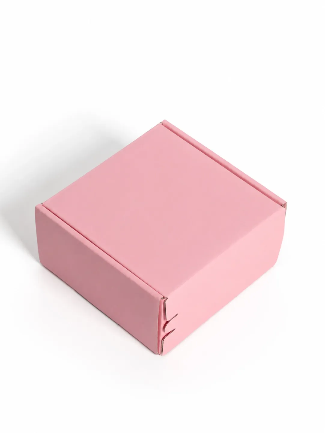 plain-pink-mailer-box-closed-angled-view