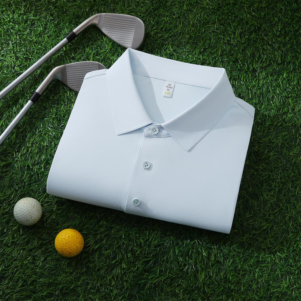 White cap and custom polo corporate apparel flat lay
