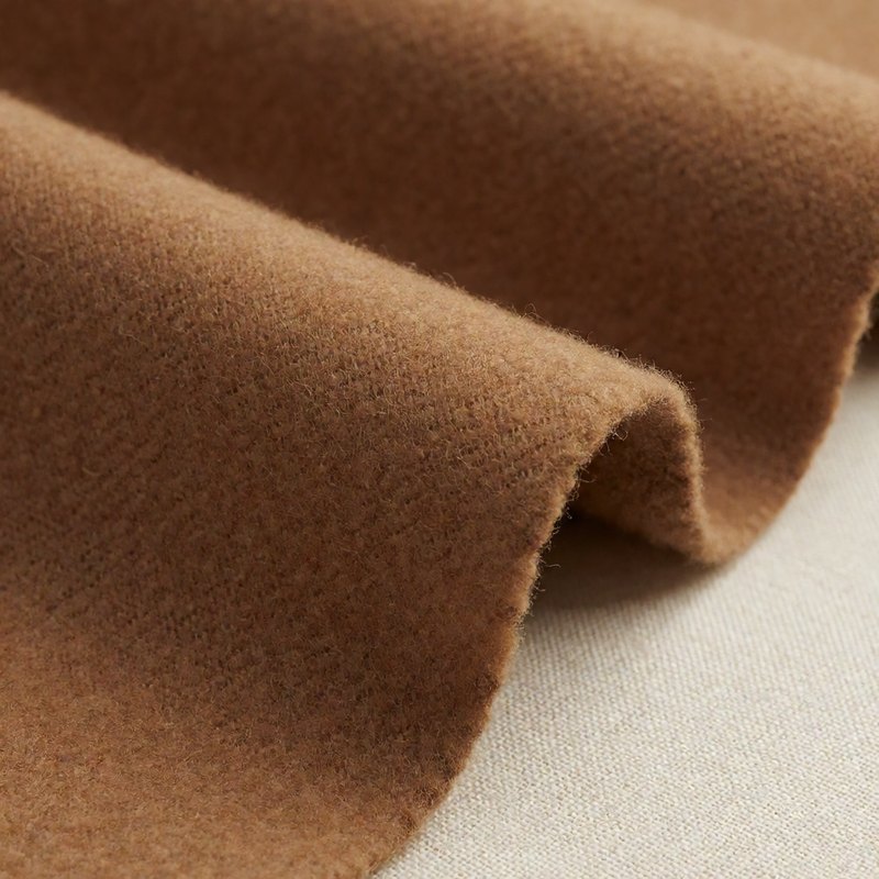 Macro of camel brown flannel suiting fabric