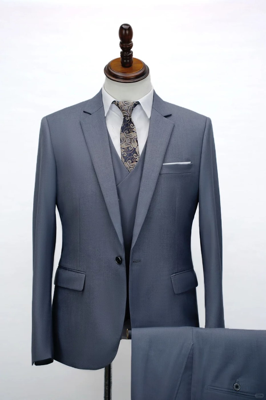 Gray three-piece suit on mannequin, front view