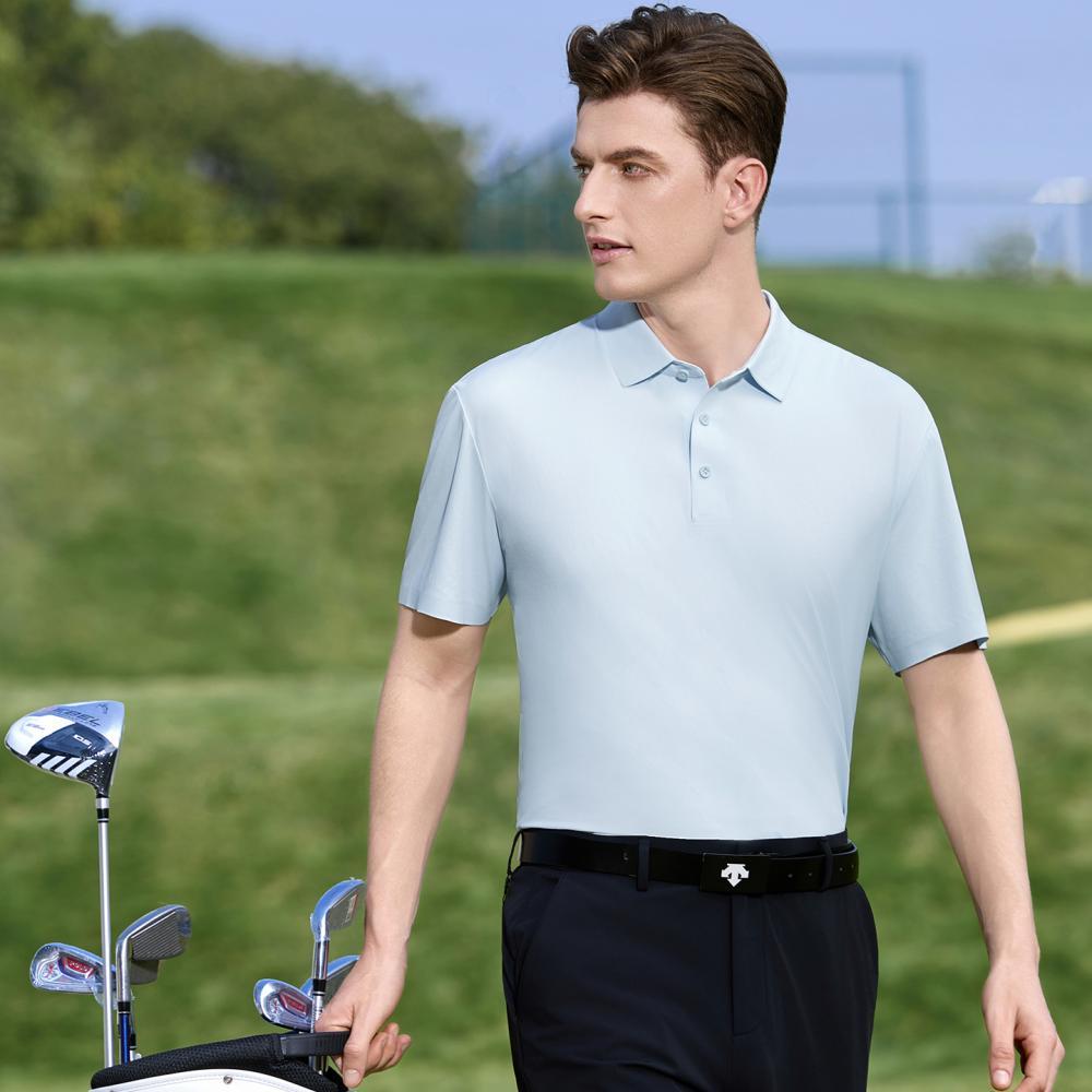 Navy custom teamwear polo worn on a golf course