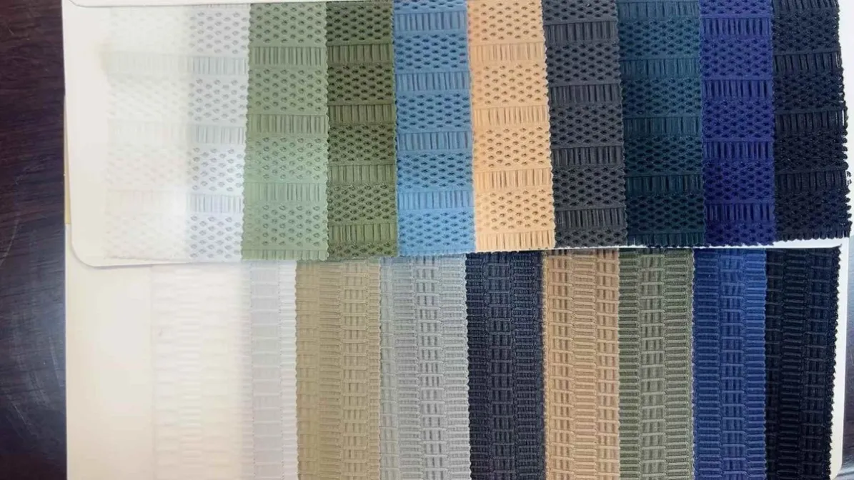 Fabric swatch cards laid out for material review