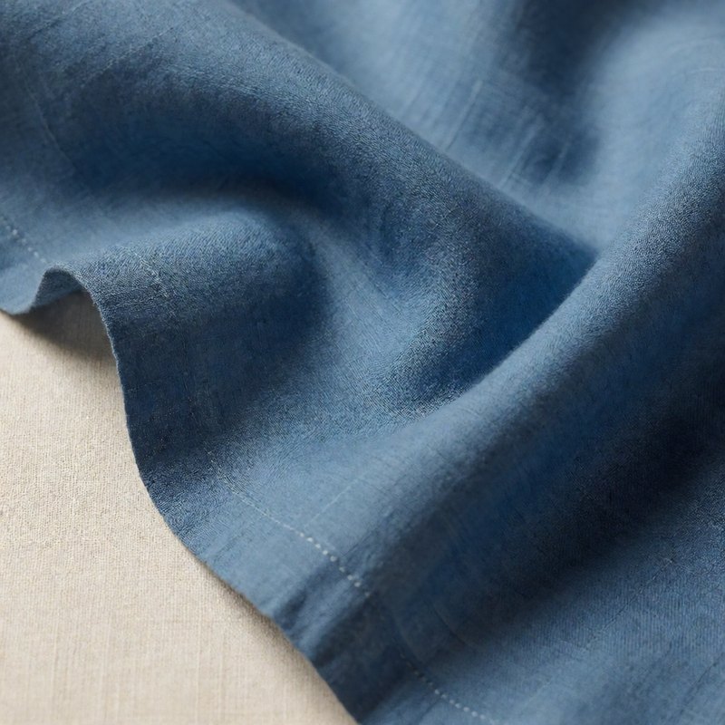 Macro of lake-blue silk-linen-wool suiting fabric