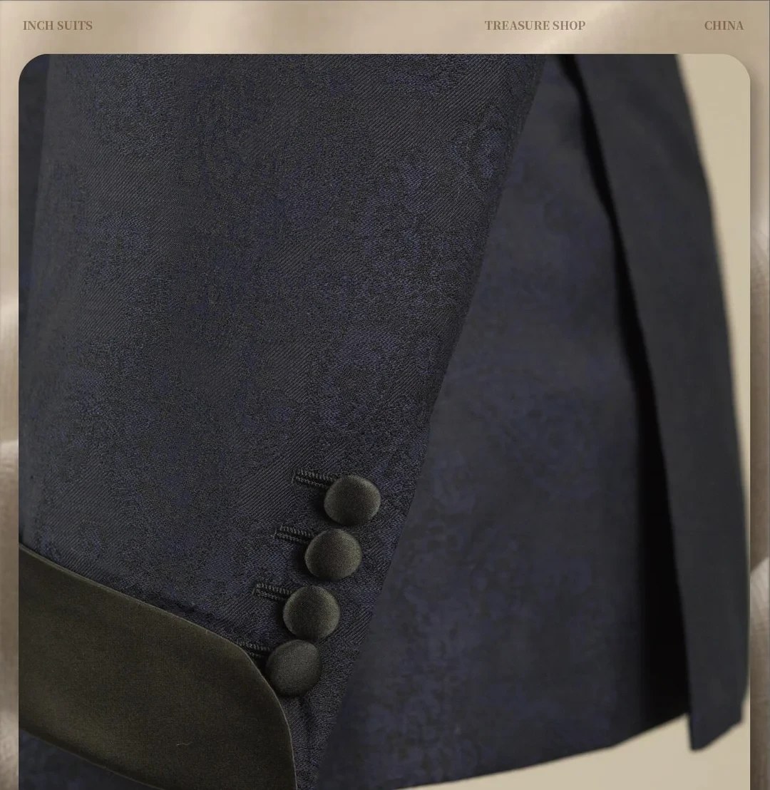 Dark suit cuff buttons close-up