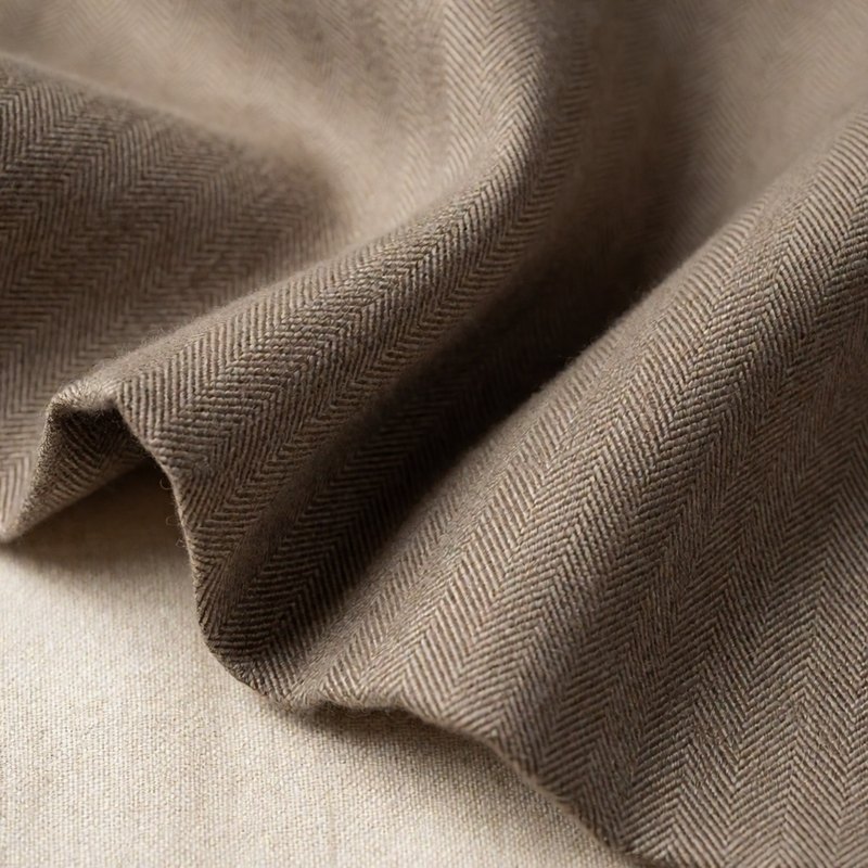 Macro of taupe silk-linen herringbone fabric