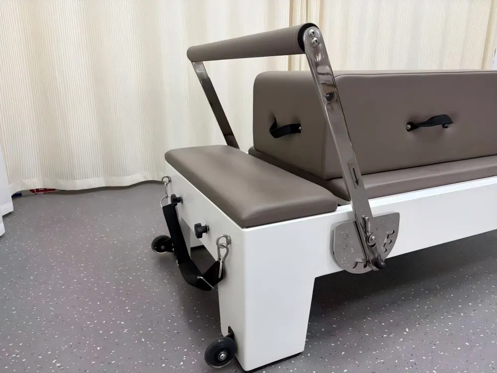 white-painted-rubberwood-reformer-adjustable-footbar.jpg