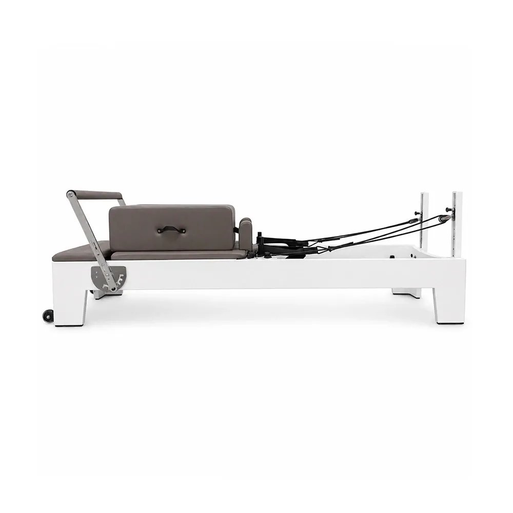 white-painted-rubberwood-pilates-reformer-side-view