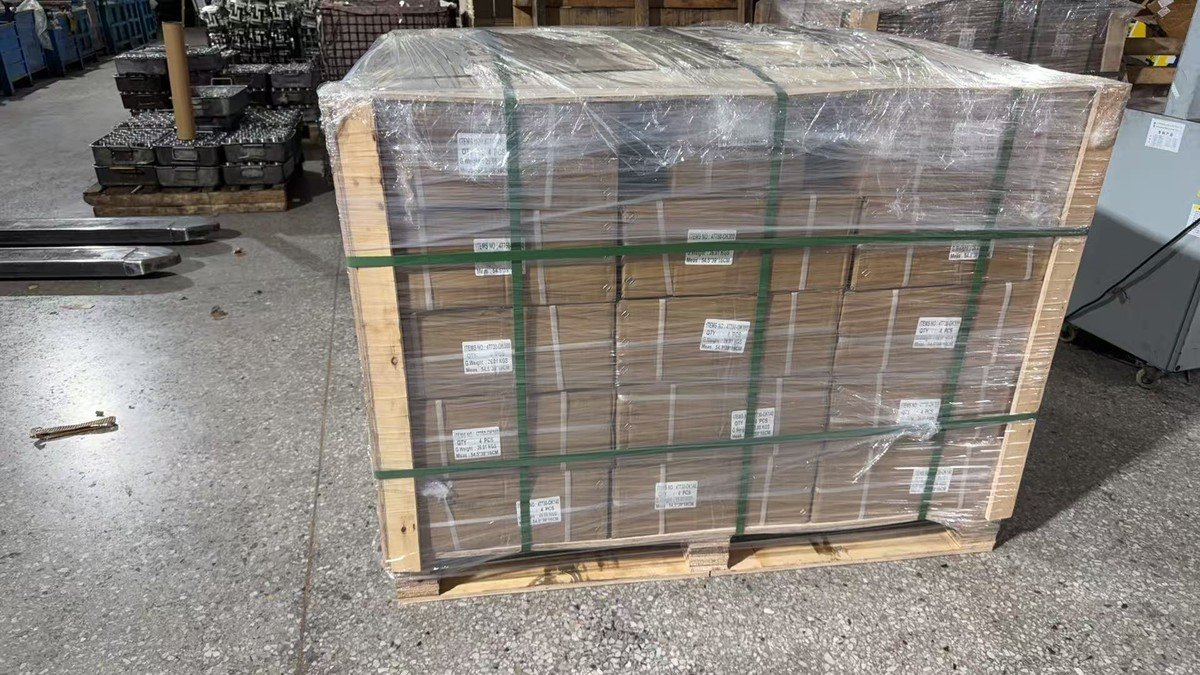 Brake caliper export cartons with labels, strapping, stretch wrap and wooden framing at Shibao Brake