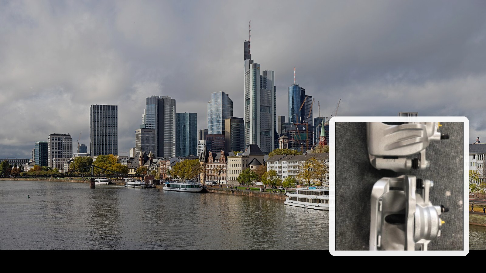 Frankfurt skyline with a Shibao brake caliper card - Automechanika Frankfurt buyer guide cover. Skyline photo: Joerg Braukmann, CC BY-SA 4.0, Wikimedia Commons.