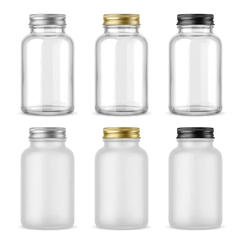 Six wide-mouth glass capsule bottles in two rows: clear and frosted glass with silver, gold and black metal caps