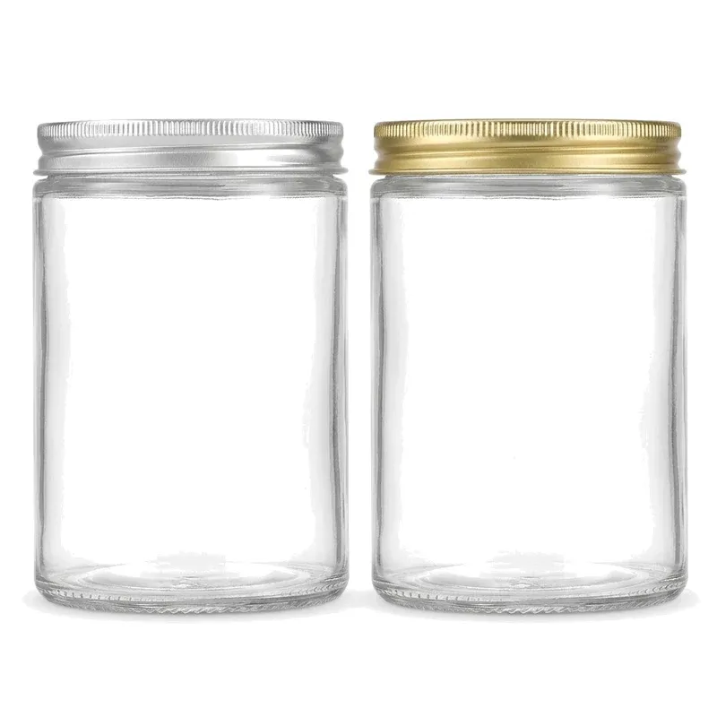 Two identical clear glass storage jars comparing silver and gold knurled metal screw lids