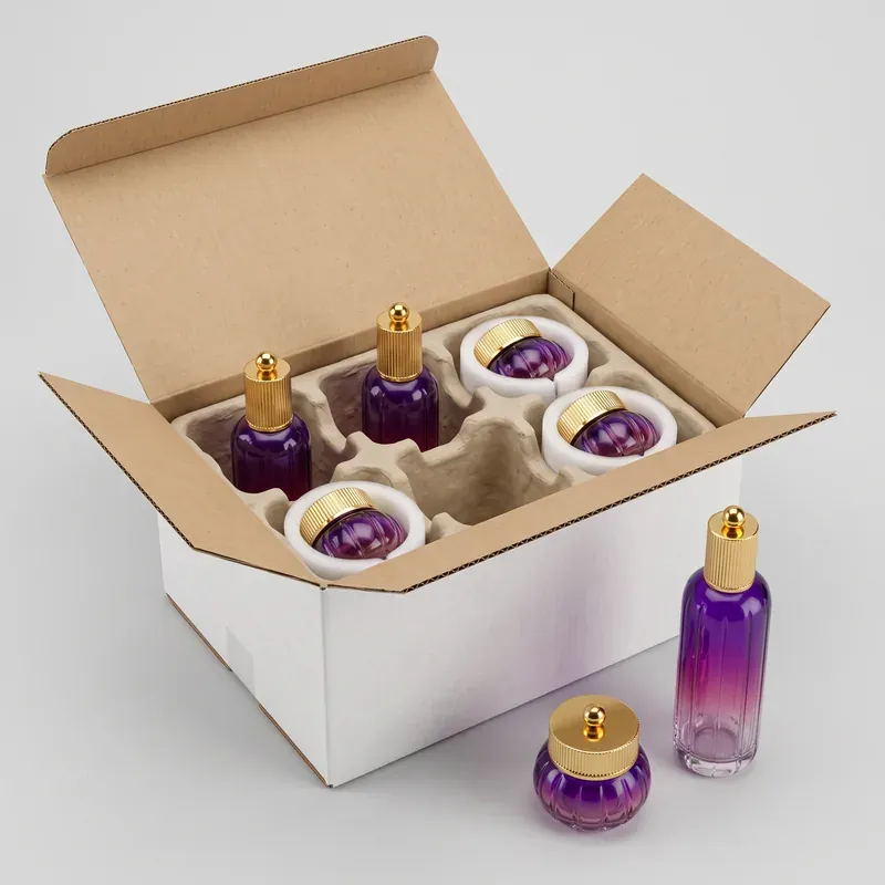 Purple gradient glass skincare set export packing: bottles and jars held in a molded pulp divider inside a white shipping carton
