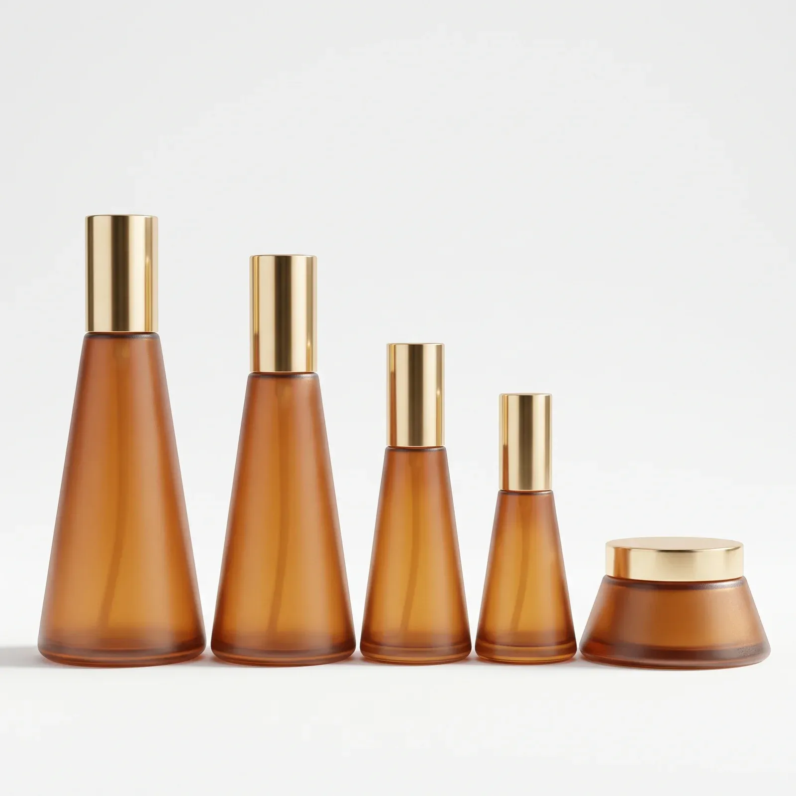 Five-piece amber conical glass set lineup on white background: four bottles tall to small and one cream jar