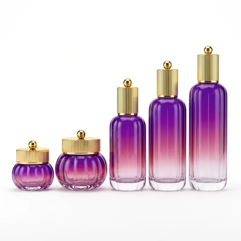 Five-piece purple gradient glass skincare set size ladder on white background: two pumpkin-ribbed cream jars and three rounded-shoulder bottles with gold fluted caps
