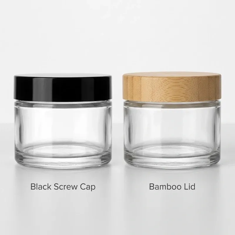 Two identical glass cream jars with different lids: black screw cap and natural bamboo lid
