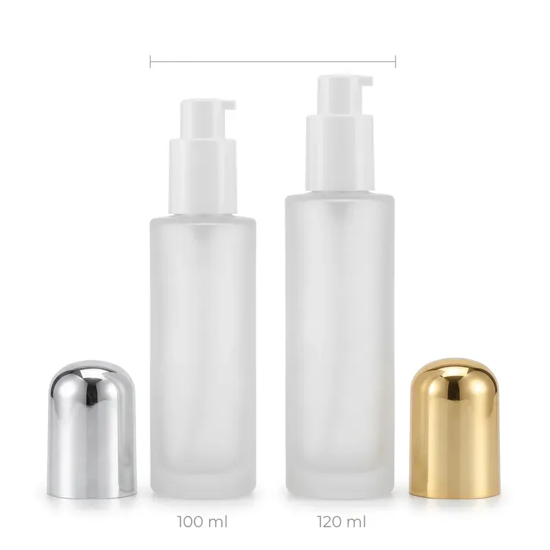 Frosted glass pump bottle size chart on white background: 100 ml and 120 ml cylindrical bottles with silver and gold dome overcaps