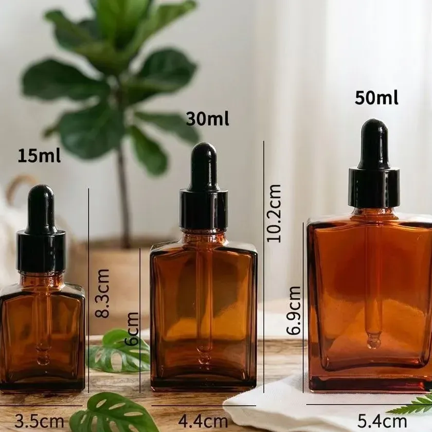 Dimension reference of 15 ml, 30 ml and 50 ml square amber glass dropper bottles as marked on supplier image
