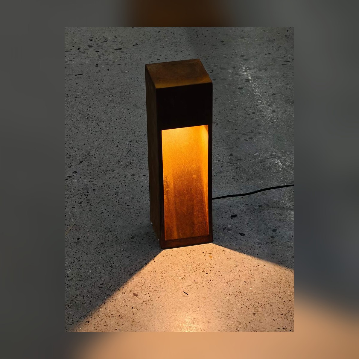 NAG-RUST Custom Weathering-Steel Bollard - Square & Round - square style at dusk
