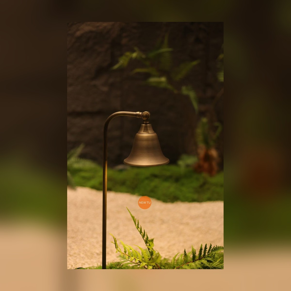 NAW-BELL Custom Brass Bell Path Light - dusk scene, stone setting