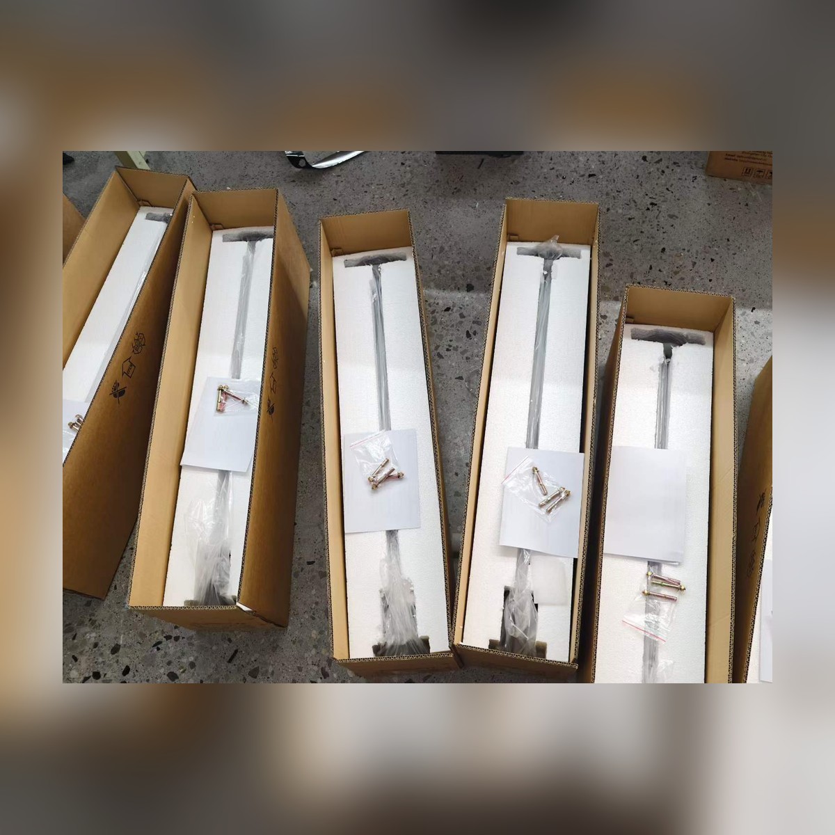 Foam packing detail - copper stems and brass accessories packed for safe transport - NoorArch outdoor lighting