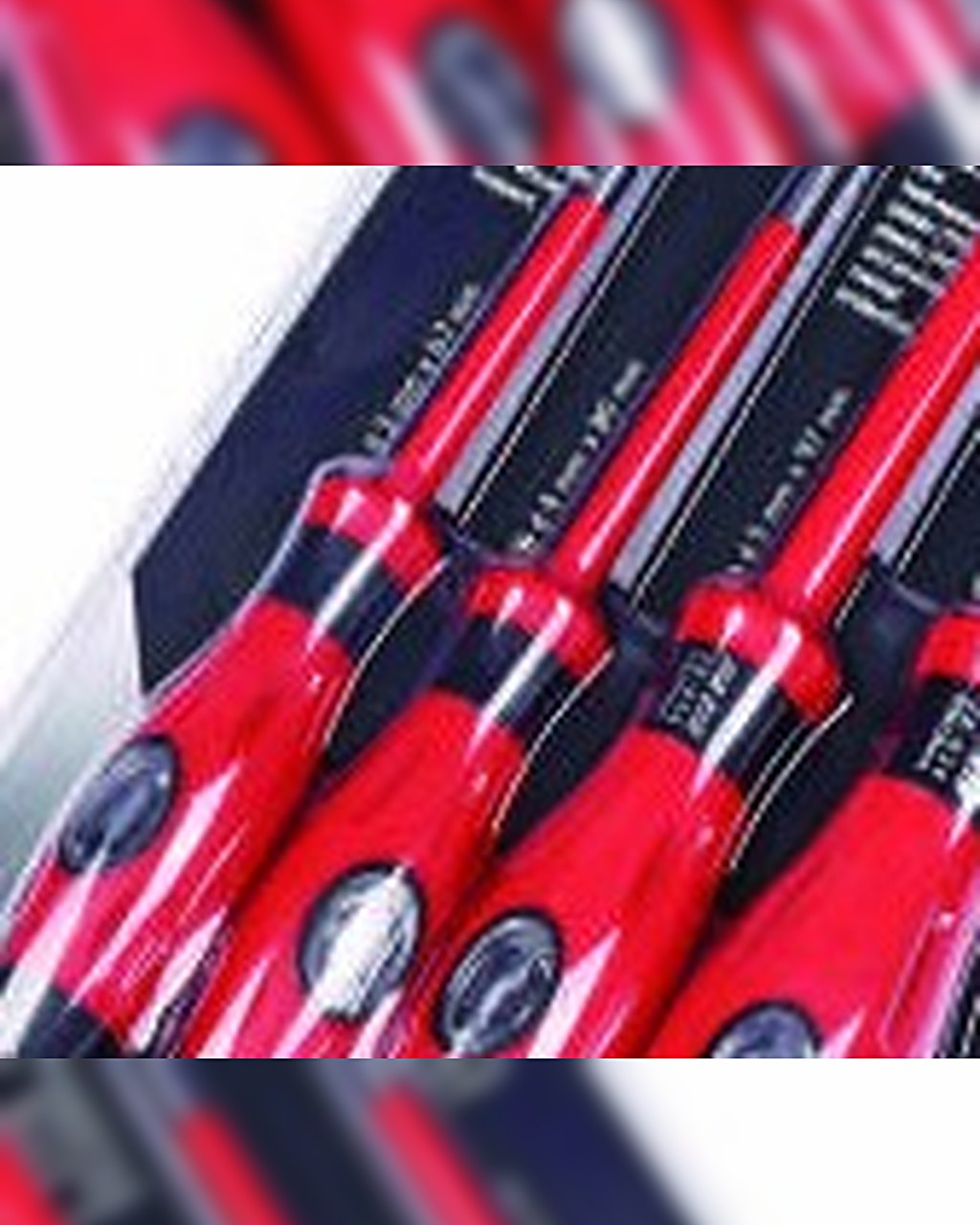 Four red voltage tester screwdrivers with black heat-resistant handles